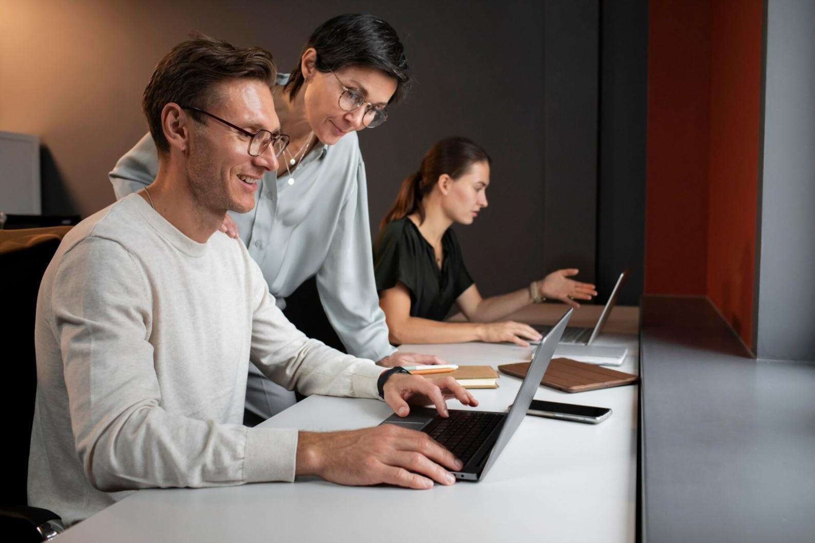 Business professionals analyzing financial data during training workshop
